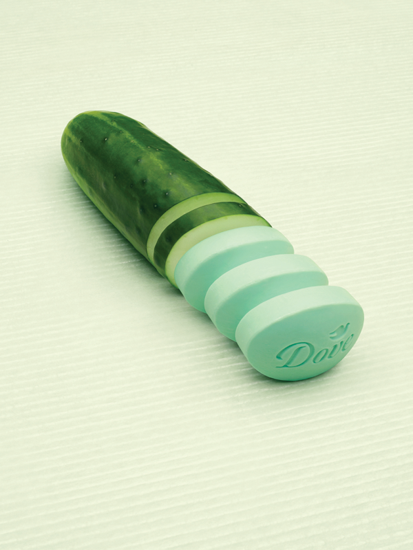 A cucumber is sliced and gradually the slices become Dove Cool Moisture bars.